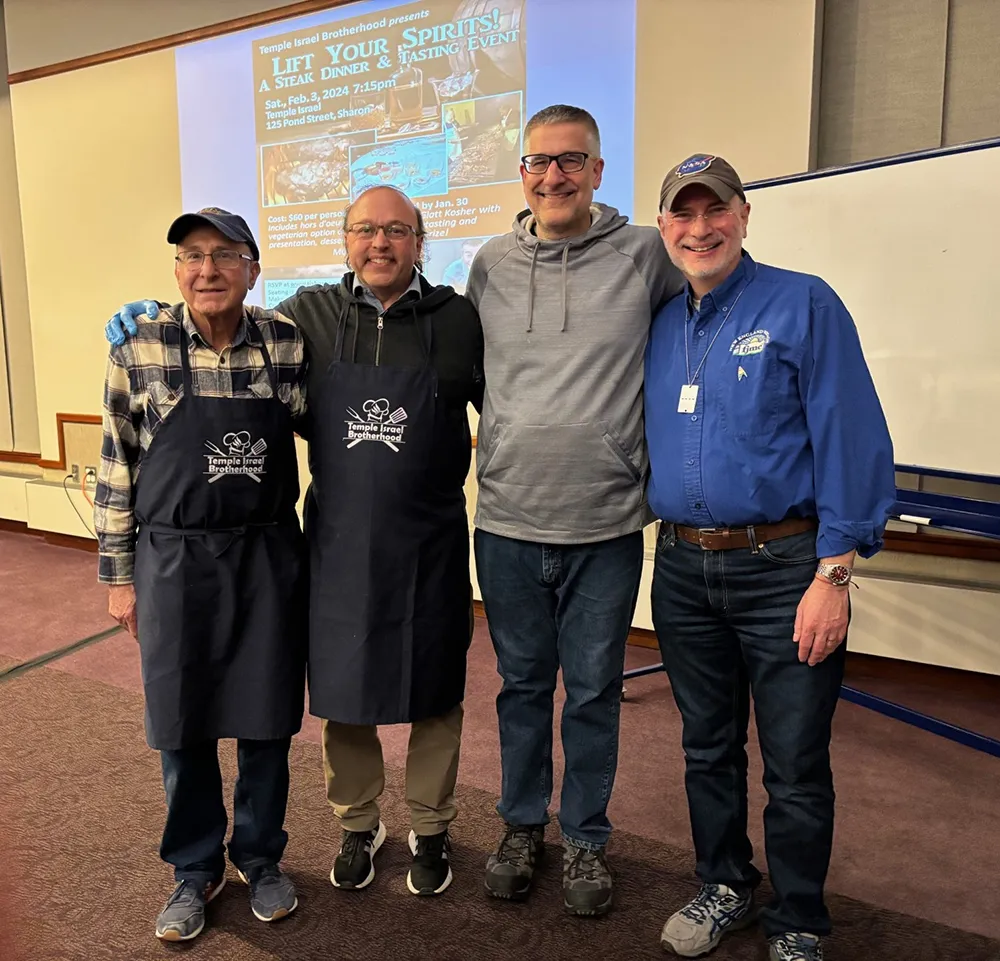 4 men posing from a Brotherhood event