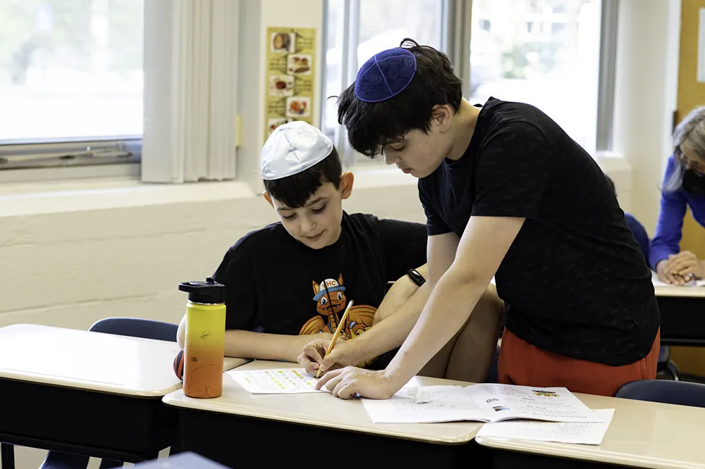 two boys working on homework